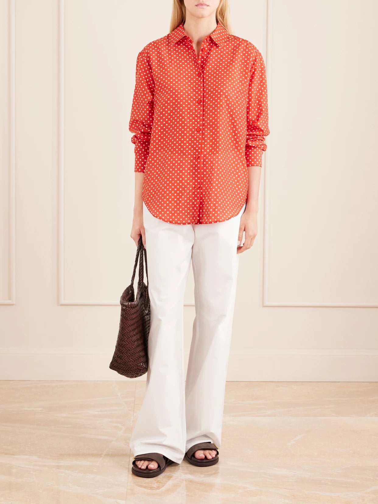 Image of a model wearing Tops. Product name - Polka Dots Organic Cotton Blend Shirt in Red colour by brand - Matteau