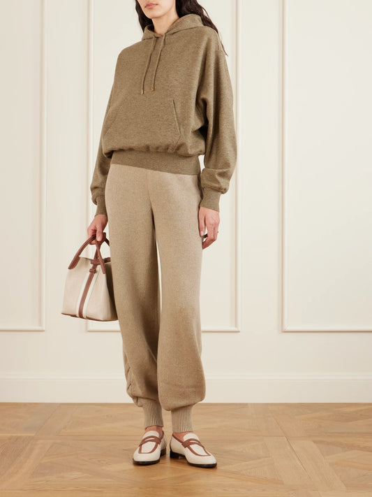 Image of a model wearing Outerwear. Product name - Rio Bodro Cashmere-blend Hoodie in Brown colour by brand - Loro Piana