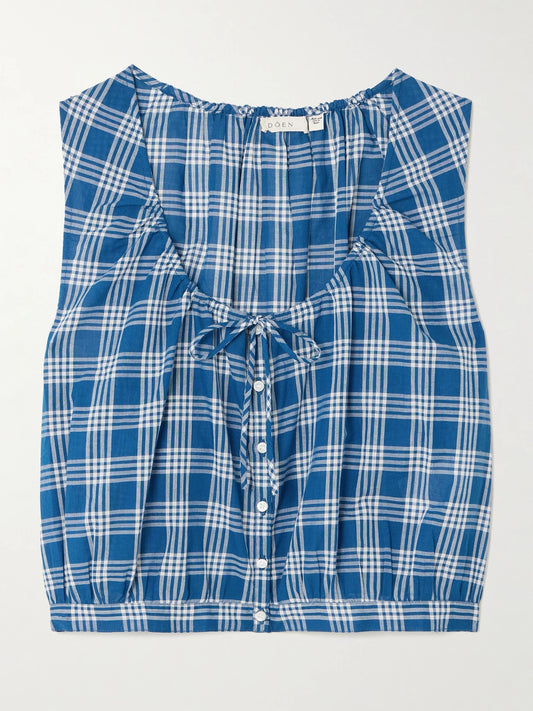Image of a model wearing Tops. Product name - Theo Cropped Checked Organic Cotton Top in Blue colour by brand - DÔEN
