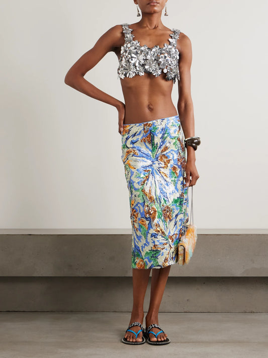 Image of a model wearing Tops. Product name - Cropped Embellished Chainmail Top in Silver colour by brand - RABANNE