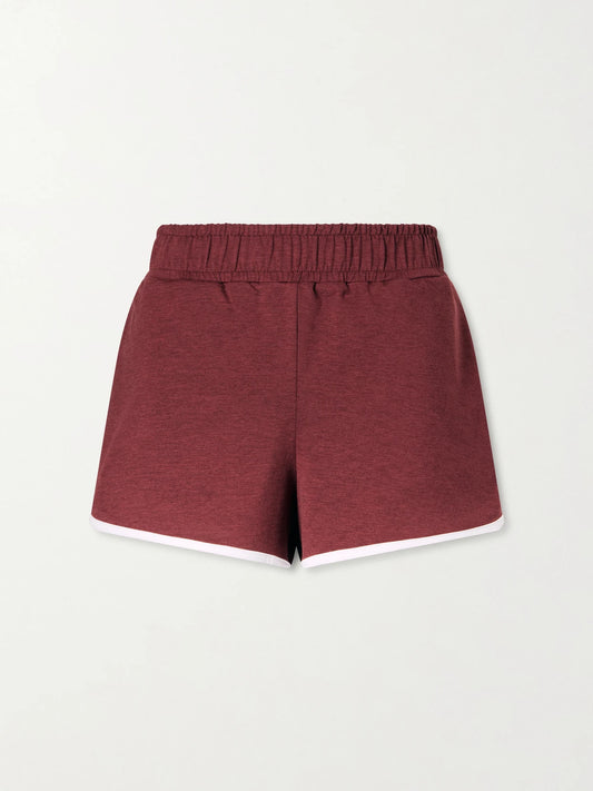 Image of a model wearing Shorts. Product name - Marty Jersey Shorts in Burgundy colour by brand - Varley