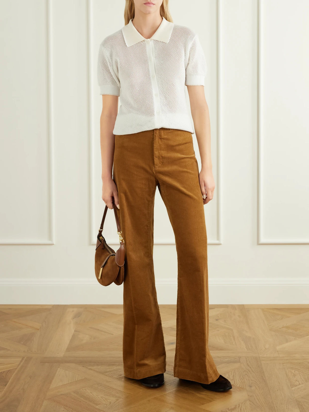 Image of a model wearing Pants. Product name - Cotton-blend Corduroy Wide-leg Pants in Tan colour by brand - Polo Ralph Lauren