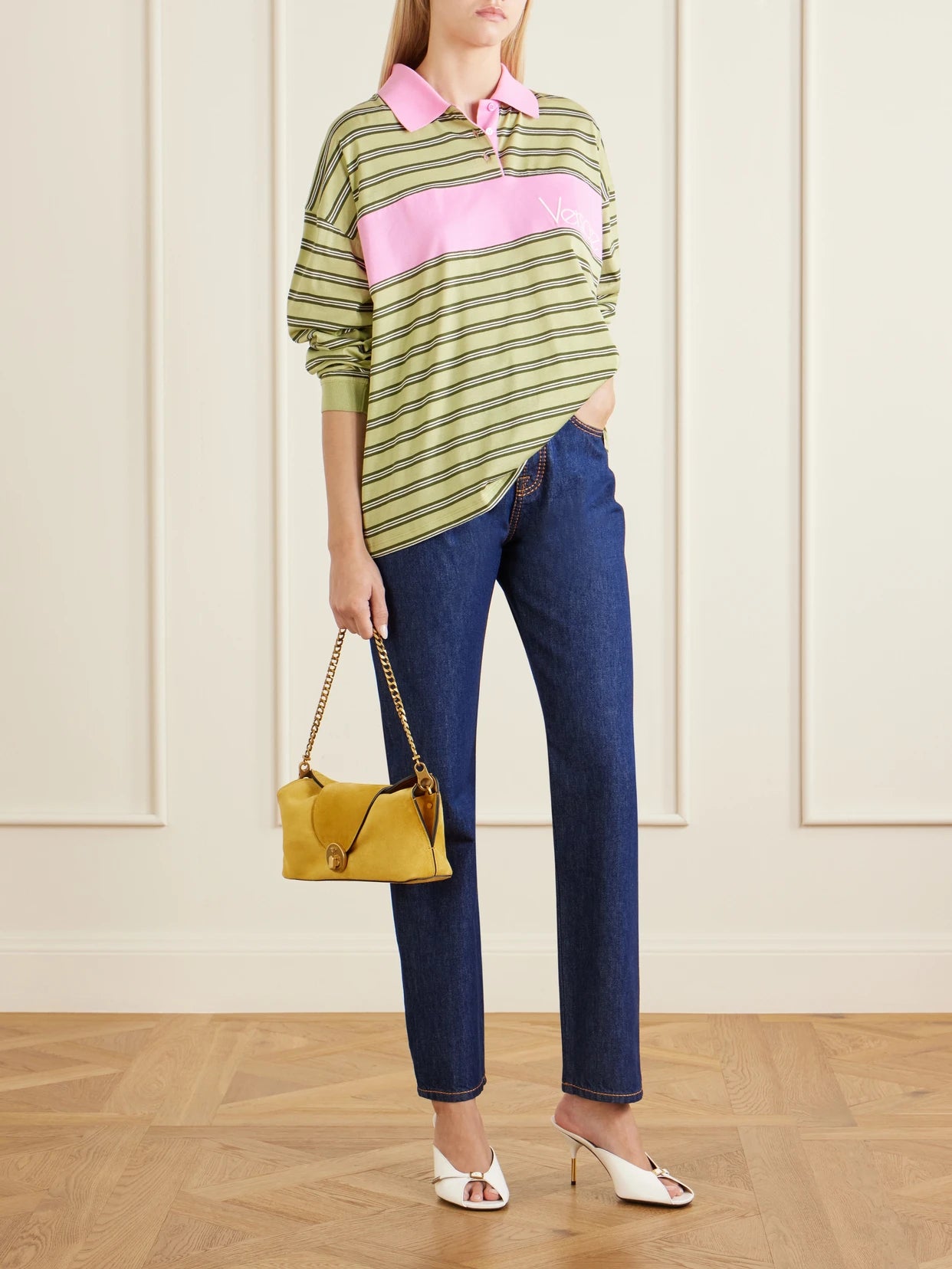 Image of a model wearing Tops. Product name - Logo-embroidered Striped Cotton-jersey Polo Shirt in Brown colour by brand - Versace