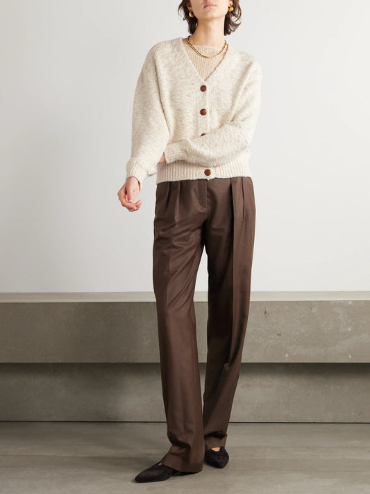 Image of a model wearing Outerwear. Product name - Cashmere-bouclé Cardigan in Beige colour by brand - Loro Piana