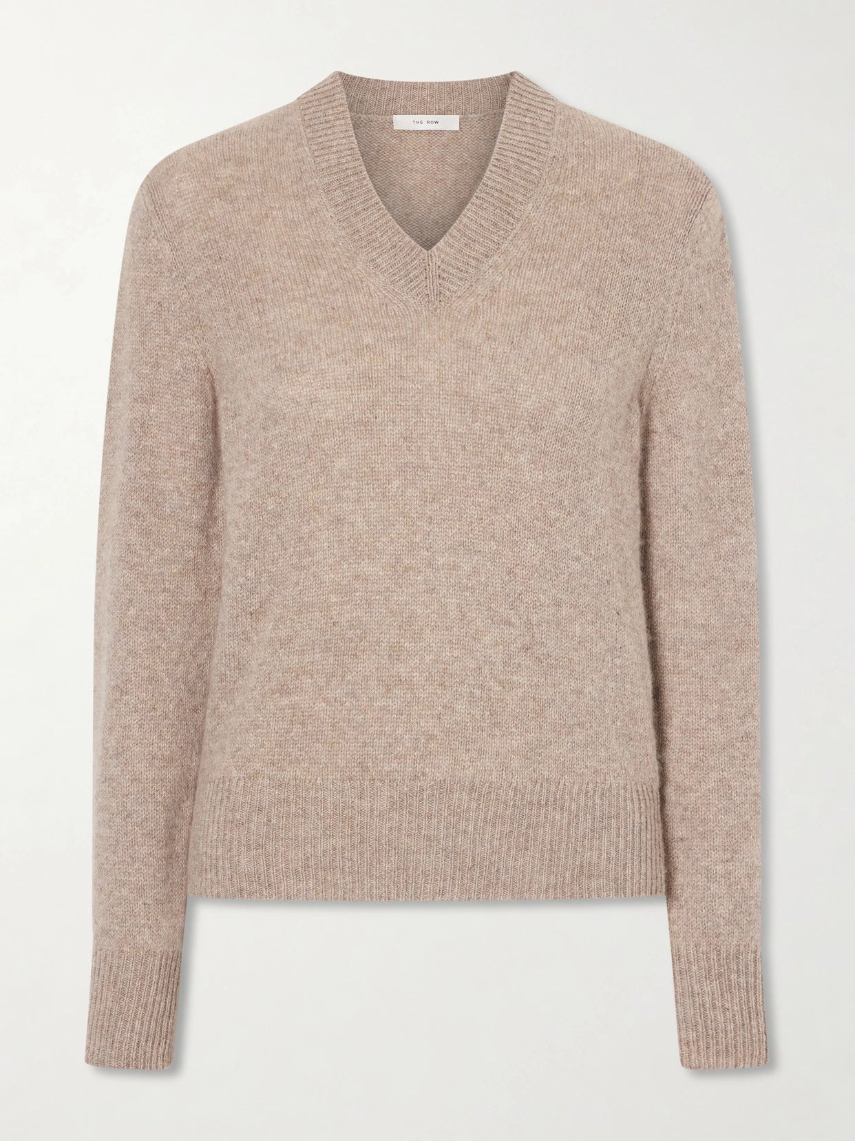 Image of a model wearing Outerwear. Product name - Nalini Cashmere Sweater in Beige colour by brand - The Row