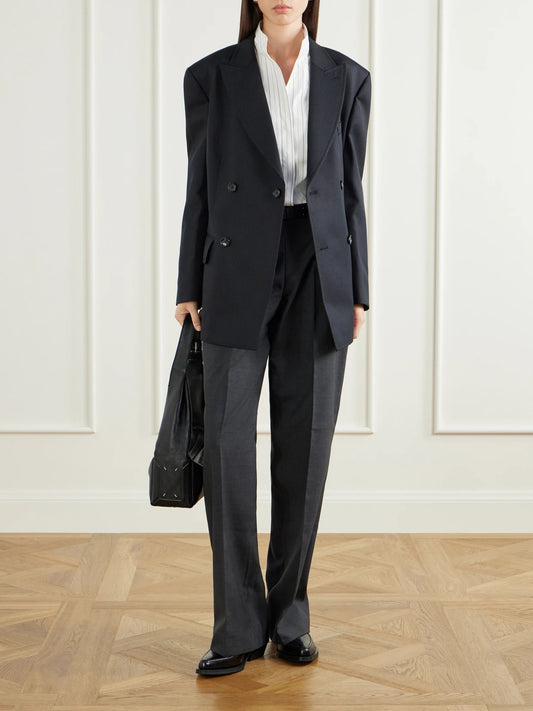 Image of a model wearing Pants. Product name - New Taper Virgin Wool Straight-leg Pants in Dark gray colour by brand - MFPEN