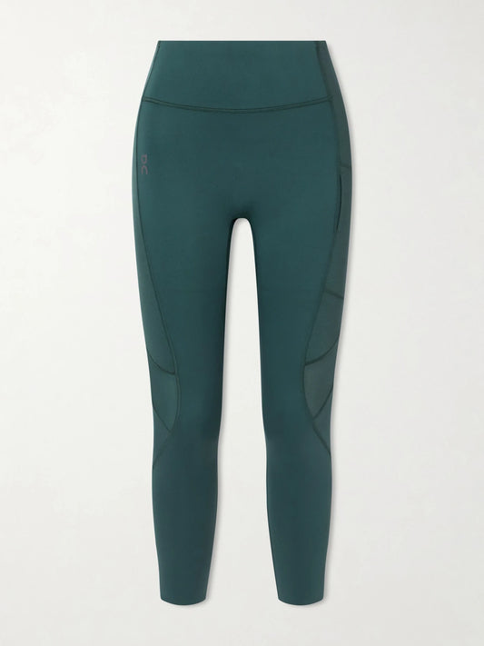 Image of a model wearing Pants. Product name - Performance Training Recycled Leggings in Blue colour by brand - ON