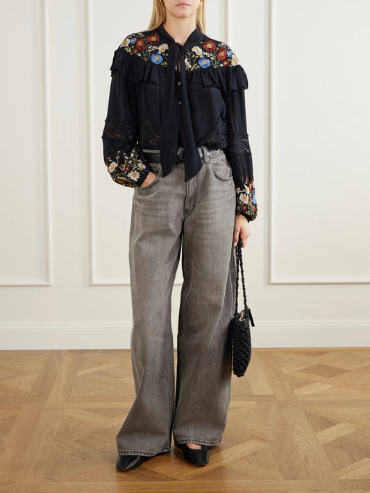 Image of a model wearing Tops. Product name - Ruwa Ruffled Embroidered Lace-trimmed Crepe Blouse in Black colour by brand - Sea