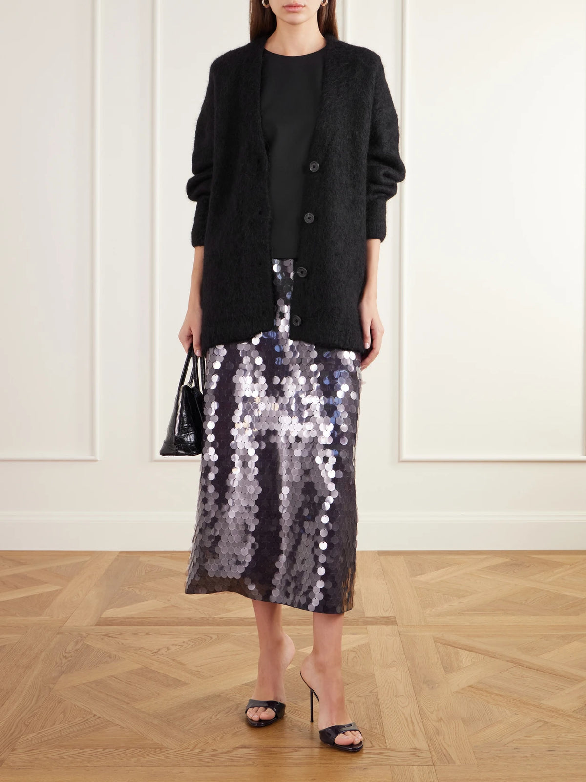 Image of a model wearing Tops. Product name - Tie-detailed Crepe Top in Black colour by brand - Tibi