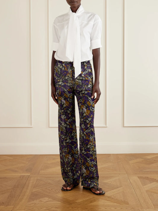 Image of a model wearing Tops. Product name - Tie-detailed Cotton-poplin Blouse in White colour by brand - Dries Van Noten