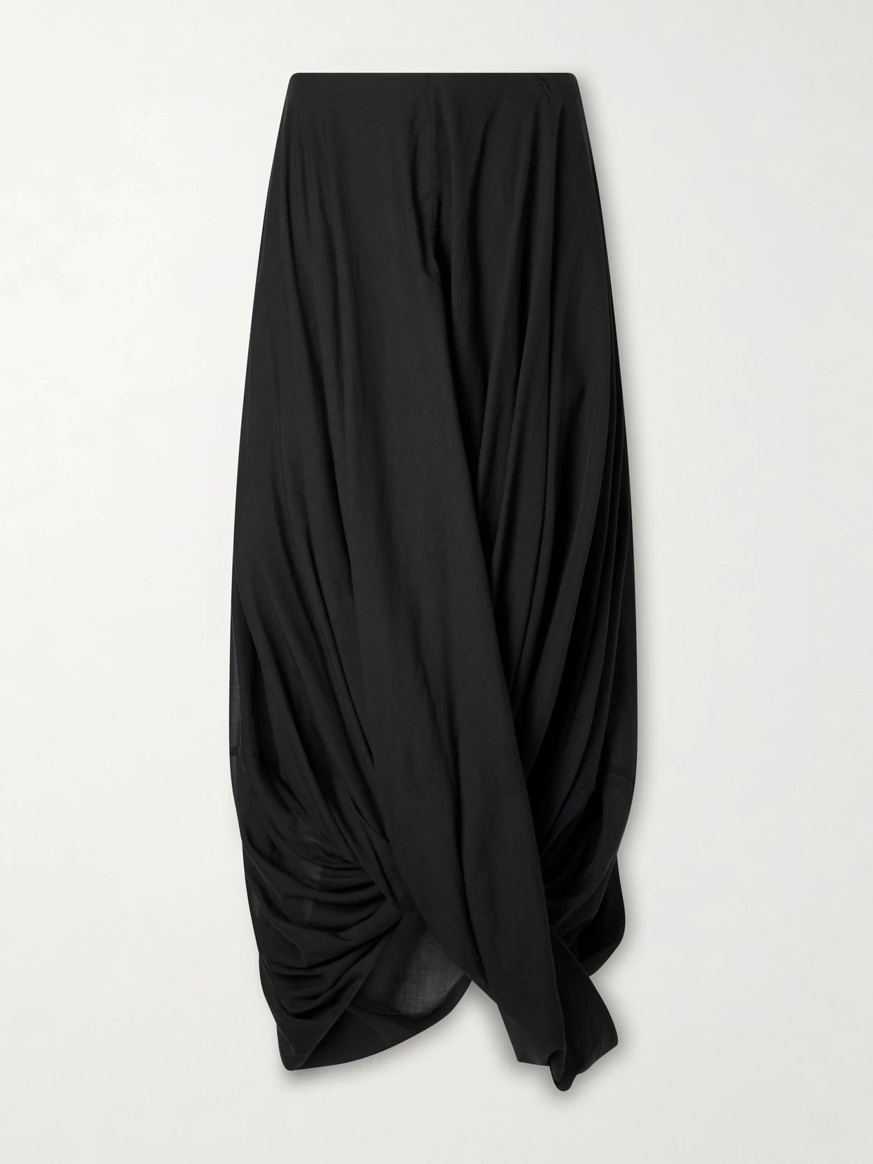 Image of a model wearing Skirts. Product name - Cocoon Draped Lyocell And Organic Cotton-blend Maxi Skirt in Black colour by brand - TOTEME