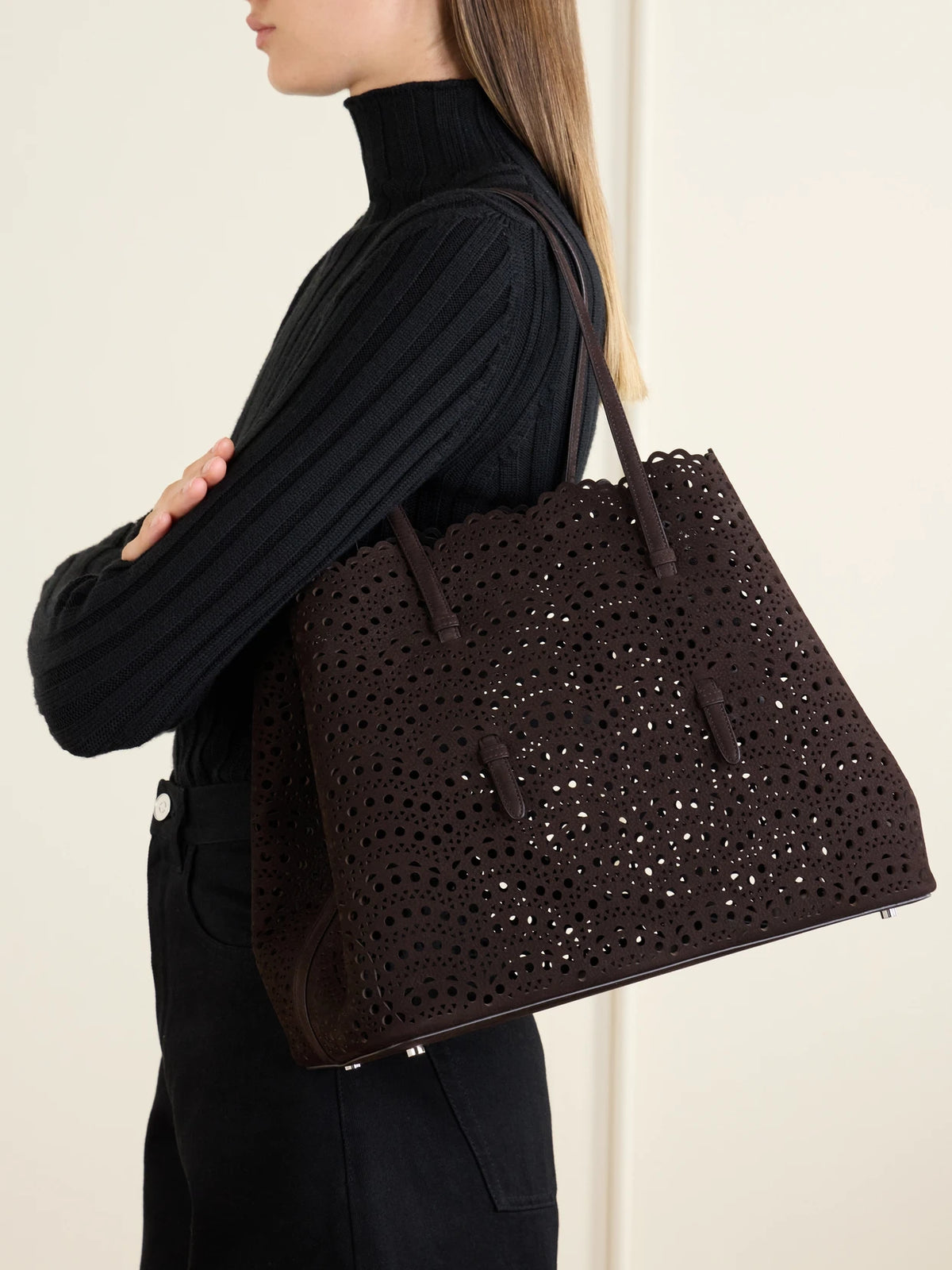 Image of Bags. Product name - Mina 37 Laser-cut Leather Tote in Chocolate colour by brand - Alaïa