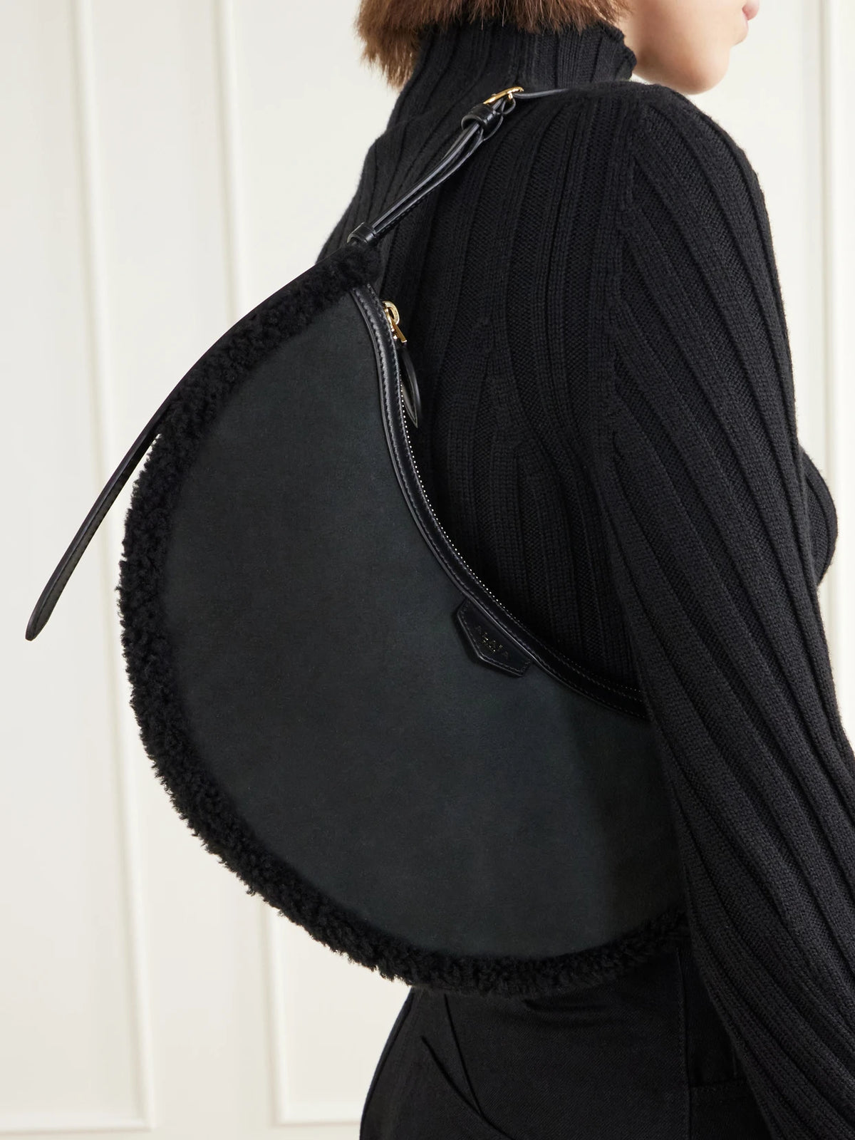 Image of Bags. Product name - Demi Lune Shearling-trimmed Suede Shoulder Bag in Black, Camel colour by brand - Alaïa