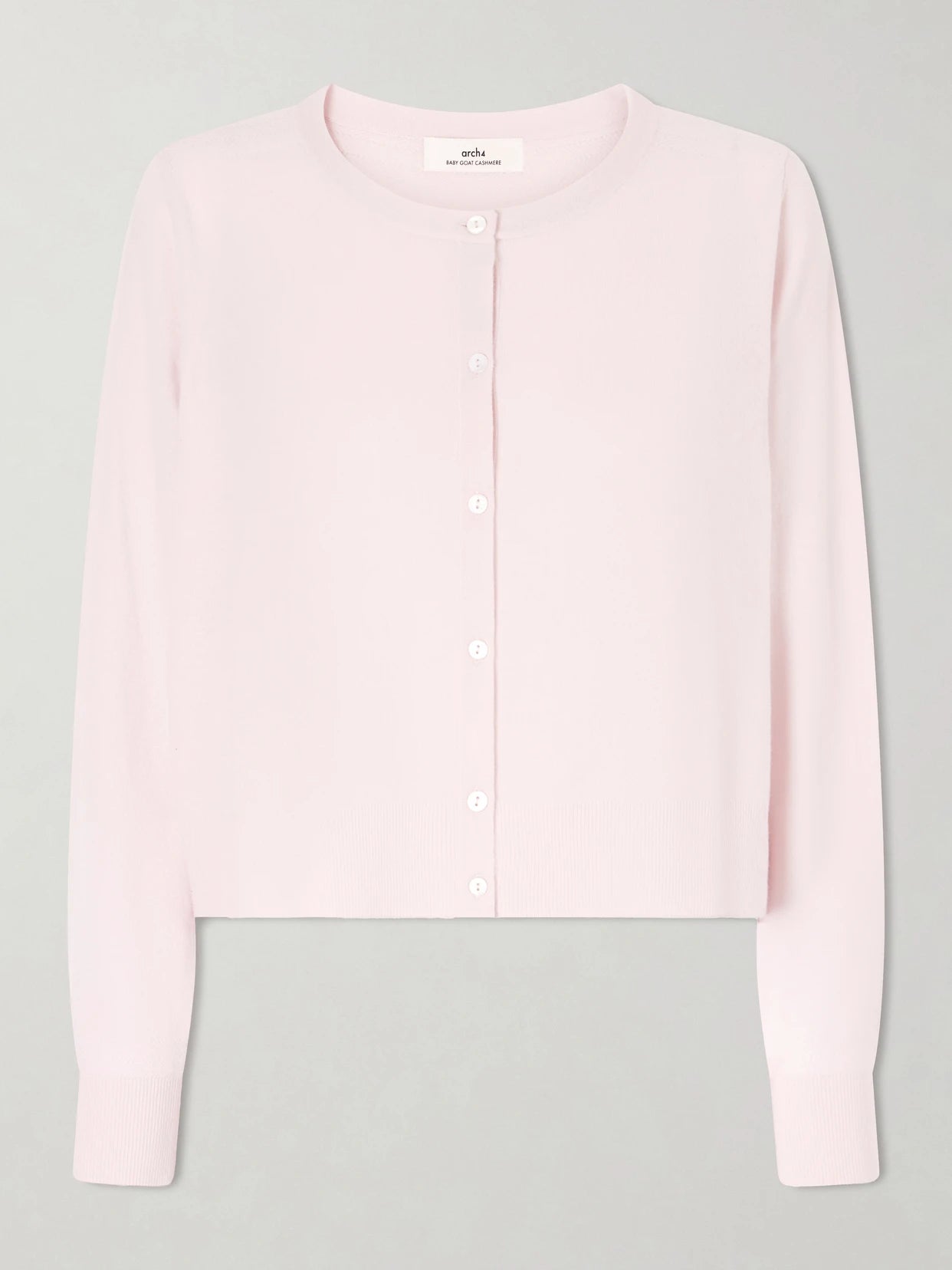 Image of a model wearing Outerwear. Product name - Bea Cashmere Cardigan in Pastel pink colour by brand - Arch4