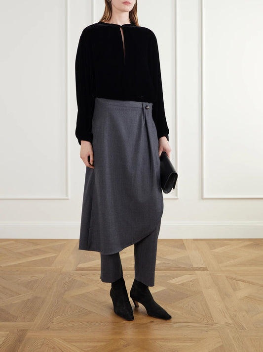 Image of a model wearing Tops. Product name - Draped Velvet Blouse in Black colour by brand - Maria McManus