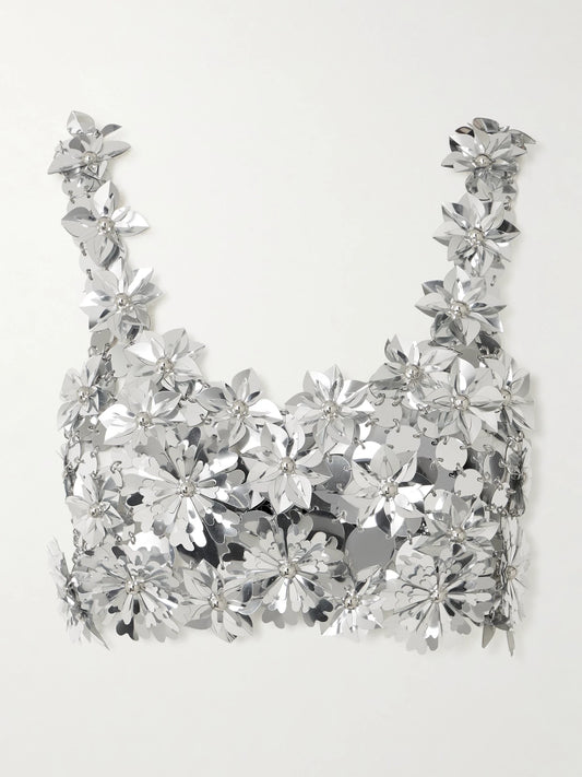 Image of a model wearing Tops. Product name - Cropped Embellished Chainmail Top in Silver colour by brand - RABANNE