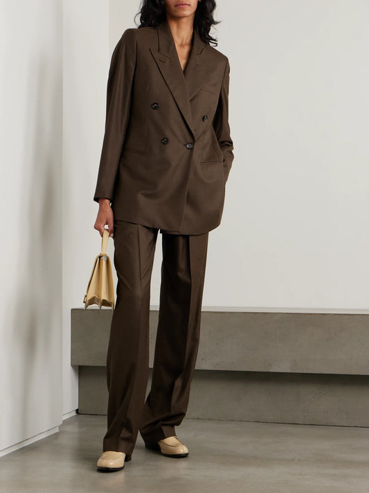 Image of a model wearing Outerwear. Product name - Oversized Double-breasted Virgin Wool Blazer in Brown colour by brand - Loro Piana