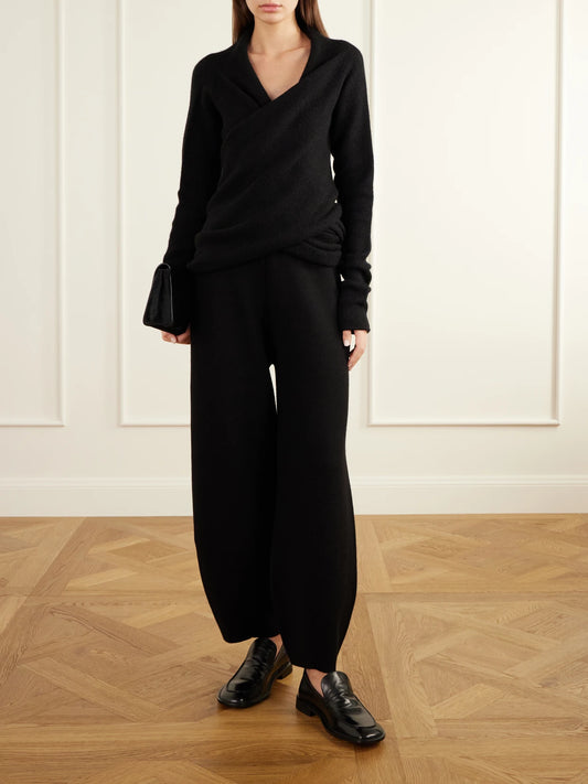 Image of a model wearing Outerwear. Product name - Soft Mobius Alpaca And Cashmere-blend Wrap Cardigan in Black colour by brand - Lauren Manoogian