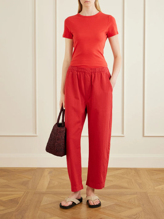 Image of a model wearing Pants. Product name - Boxer Cotton Wide-leg Pants in Red colour by brand - Jamie Haller