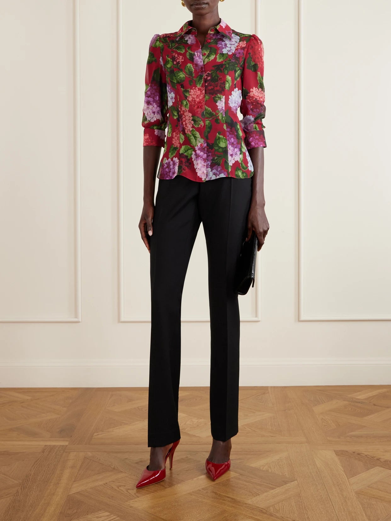Image of a model wearing Tops. Product name - Floral-print Silk-chiffon Blouse in Red colour by brand - Carolina Herrera
