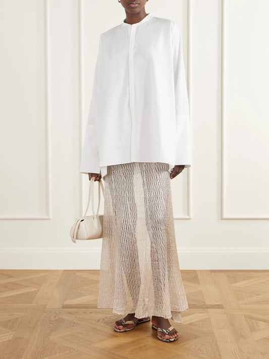 Image of a model wearing Tops. Product name - Kael Asymmetrical Cotton-poplin Shirt in White colour by brand - Ruohan