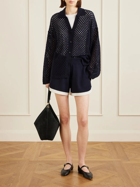 Image of a model wearing Outerwear. Product name - Open-knit Wool And Cashmere-blend Overshirt in Black colour by brand - Allude