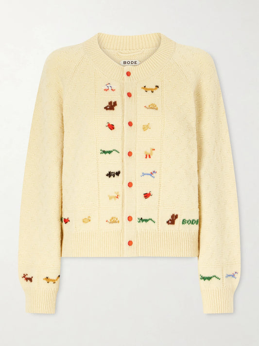 Image of a model wearing Outerwear. Product name - Zoologist Embroidered Merino Wool And Alpaca-blend Cardigan in Pastel yellow colour by brand - BODE