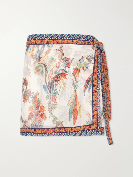 Image of a model wearing Skirts. Product name - Printed Voile Mini Wrap Skirt in White colour by brand - Etro