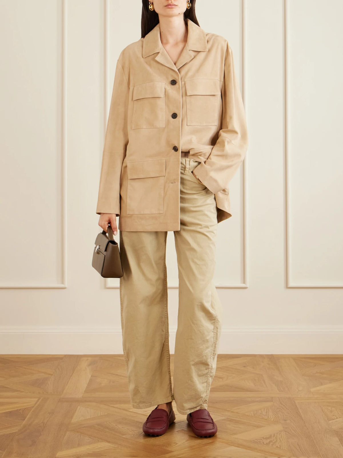Image of Flats. Product name - Gommino Textured-leather Loafers in Brick colour by brand - Tod's