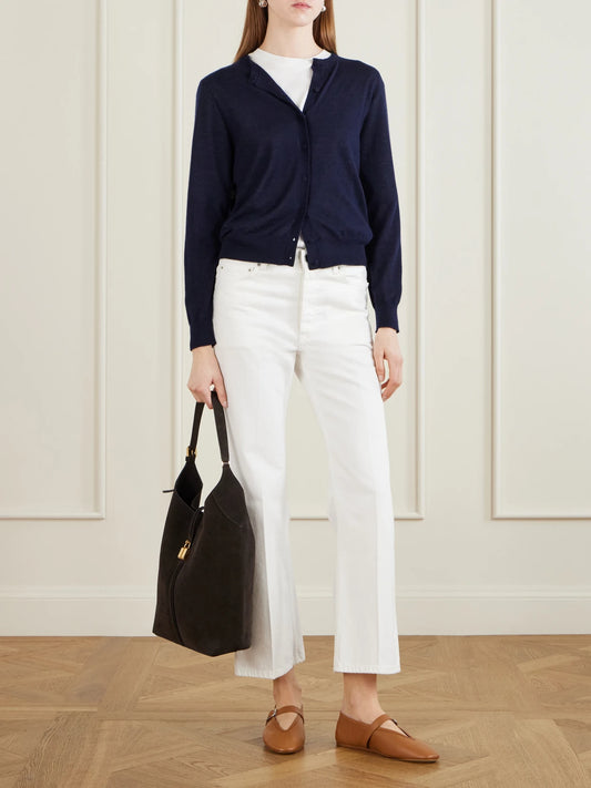 Image of a model wearing Outerwear. Product name - Elio Cashmere Cardigan in Navy colour by brand - Arch4