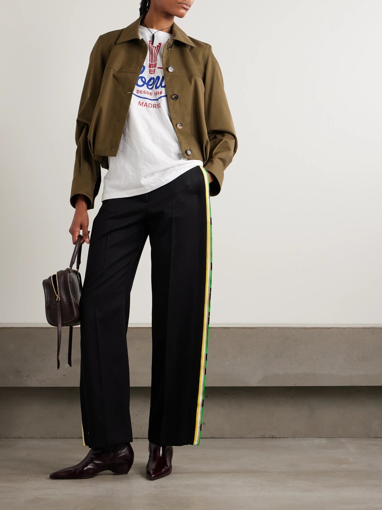 Image of a model wearing Tops. Product name - Printed Jersey T-shirt in White colour by brand - LOEWE