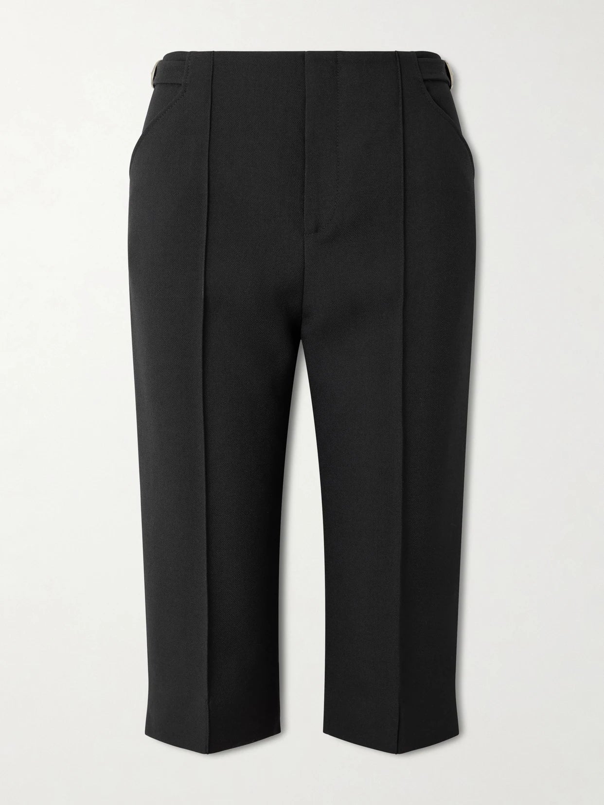Image of a model wearing Pants. Product name - Buckle-embellished Wool-crepe Straight-leg Capri Pants in Black colour by brand - Chloé