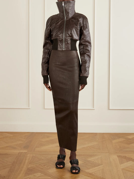 Image of a model wearing Skirts. Product name - Dirt Pillar Textured-leather Maxi Skirt in Brown colour by brand - Rick Owens