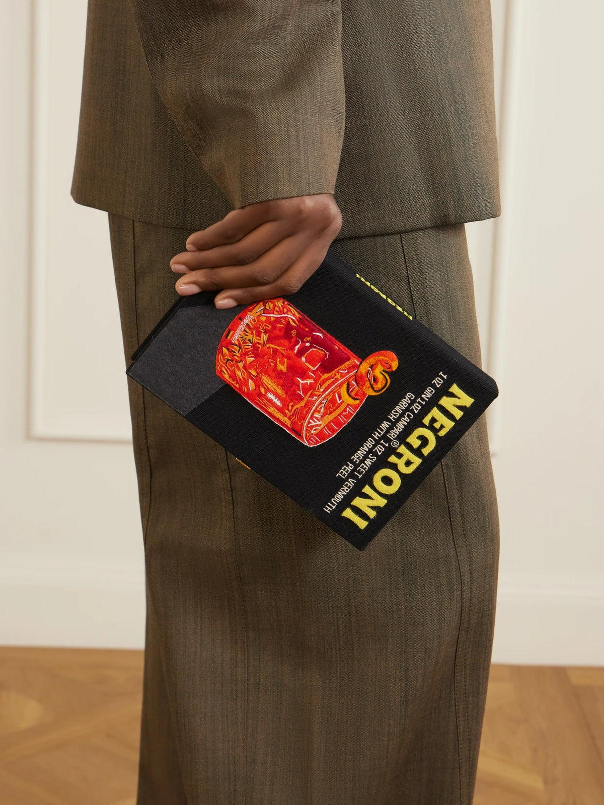 Image of Bags. Product name - Negroni Appliquéd Embroidered Canvas Clutch in Black colour by brand - Olympia Le-Tan