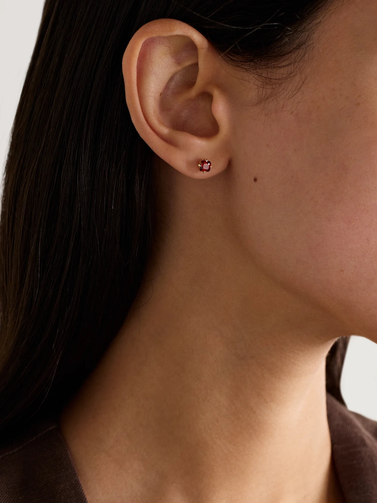 Image of Earrings. Product name - 10-karat Gold Garnet Earrings in Multi colour by brand - STONE AND STRAND