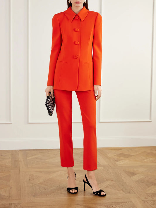 Image of a model wearing Pants. Product name - Stretch-wool Woven Slim-leg Pants in Red colour by brand - Carolina Herrera
