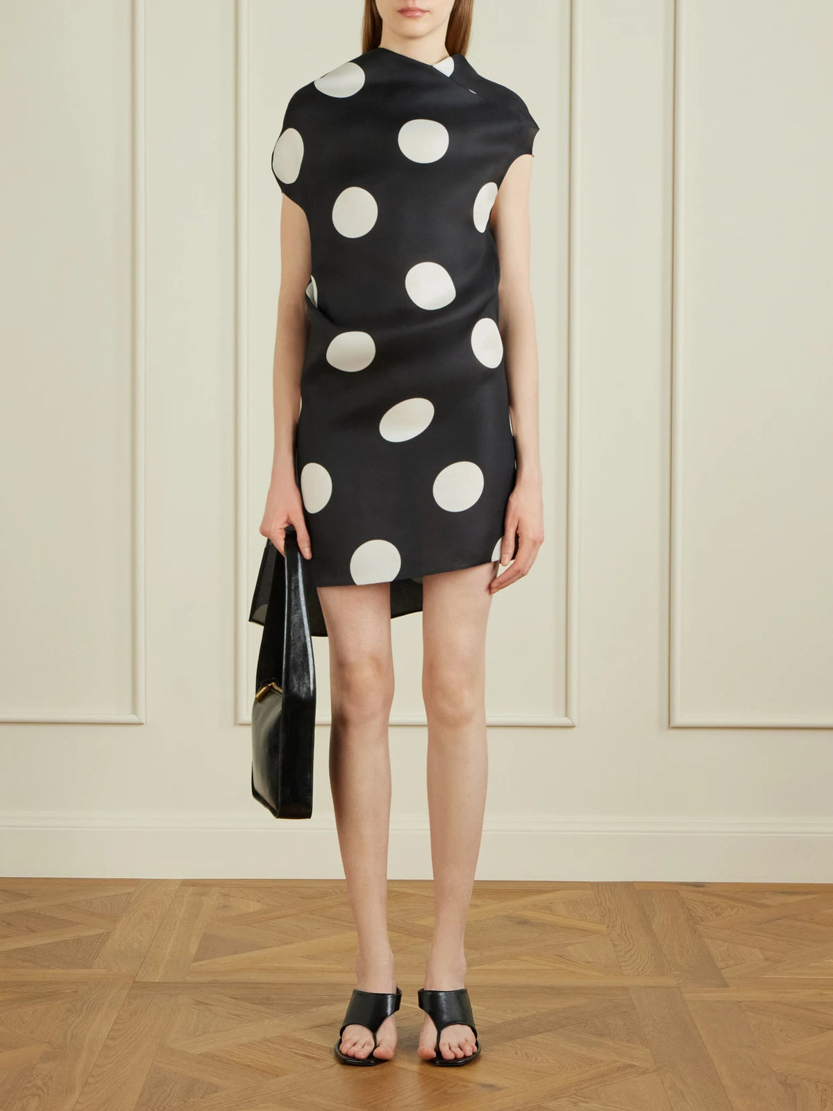 Image of Dresses. Product name - Tatia Draped Polka-dot Silk Mini Dress in Black colour by brand - KHAITE
