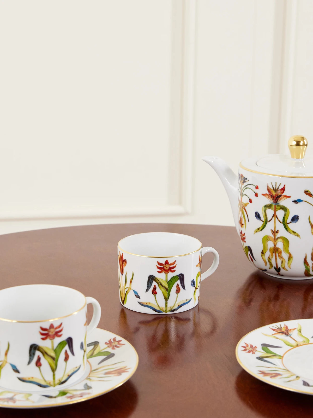 Image of Tableware. Product name - Grand Tour Set Of Two Gold-plated Porcelain Teacup And Saucer in White colour by brand - L'Objet