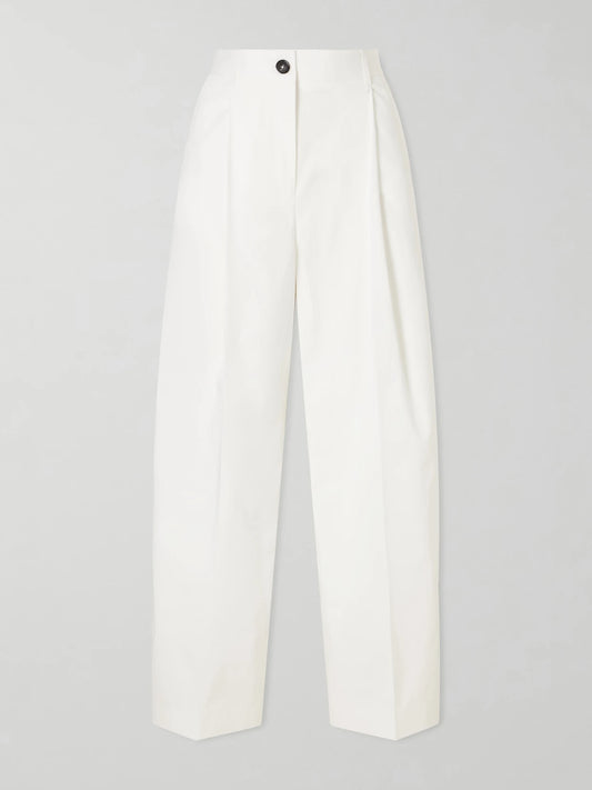 Image of a model wearing Pants. Product name - Pleated Cotton Wide-leg Trousers in White colour by brand - TOTEME
