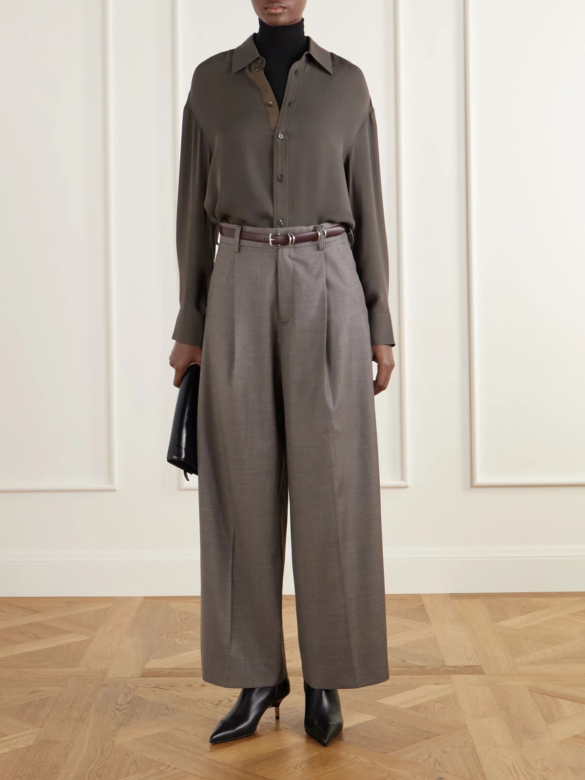 Image of a model wearing Tops. Product name - Dani Silk-double Georgette Shirt in Dark green colour by brand - KALLMEYER