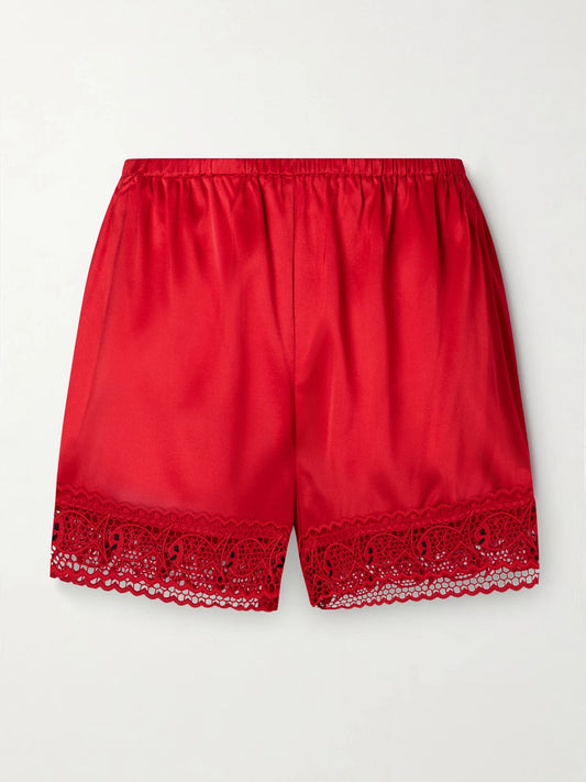 Image of a model wearing Shorts. Product name - + Da Adolfo Paddle Silk Shorts in Red colour by brand - STAUD