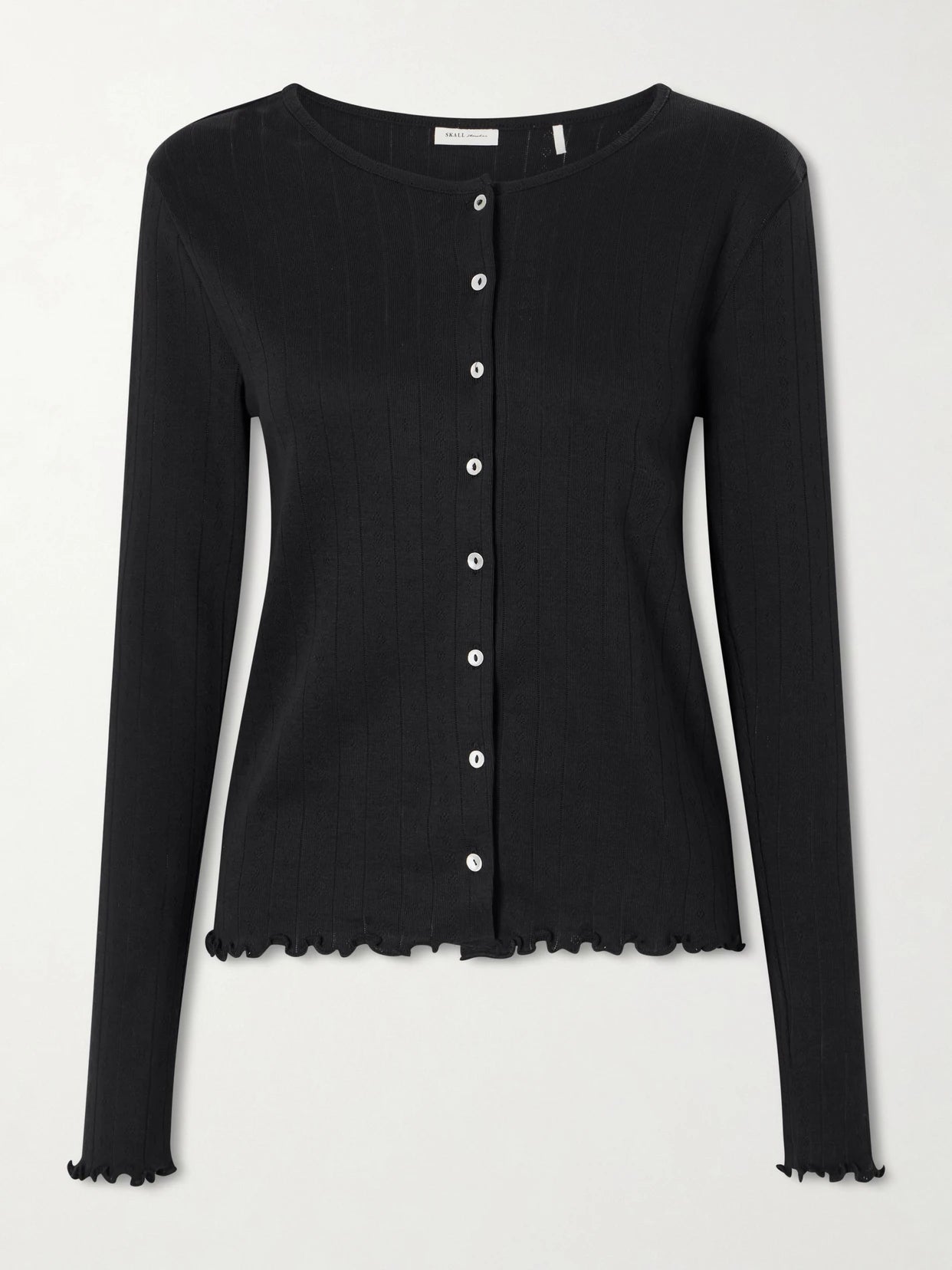 Image of a model wearing Outerwear. Product name - Edie Open-knit Organic Cotton Cardigan in Black colour by brand - SKALL