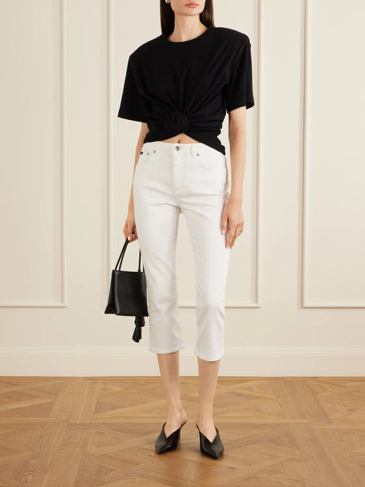 Image of a model wearing Tops. Product name - Gathered Ribbed Cotton-blend T-shirt in Black colour by brand - Magda Butrym