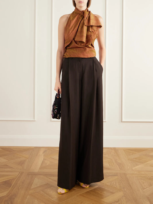 Image of a model wearing Tops. Product name - Draped Silk-dupioni Halterneck Top in Green colour by brand - Christopher John Rogers