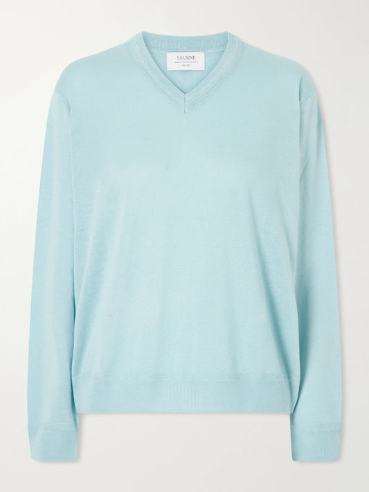 Image of a model wearing Outerwear. Product name - Ben Silk, Wool And Cashmere-blend Knit Sweater in Light blue colour by brand - La Ligne