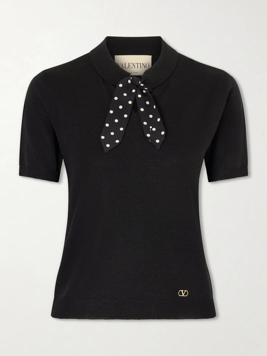 Image of a model wearing Outerwear. Product name - Silk-trimmed Wool-blend Knit Polo Shirt in Black colour by brand - Valentino Garavani