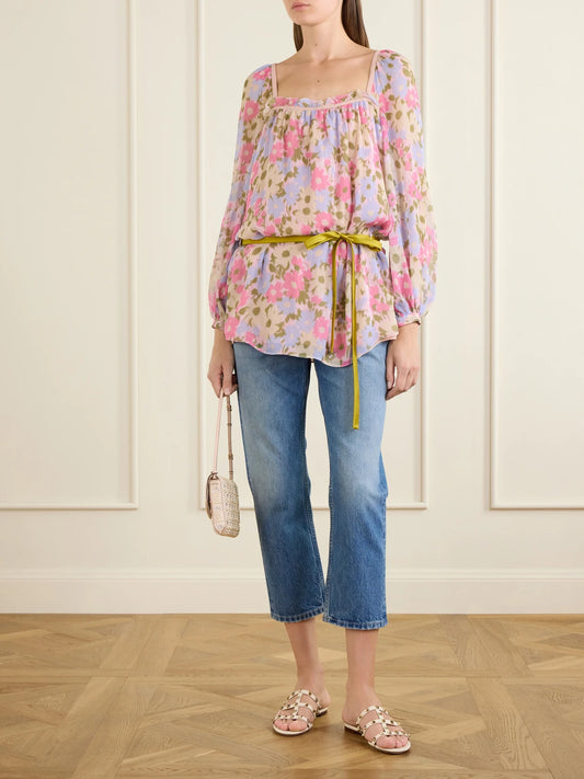 Image of a model wearing Tops. Product name - Belted Floral-print Silk-georgette Blouse in Pink colour by brand - Valentino Garavani