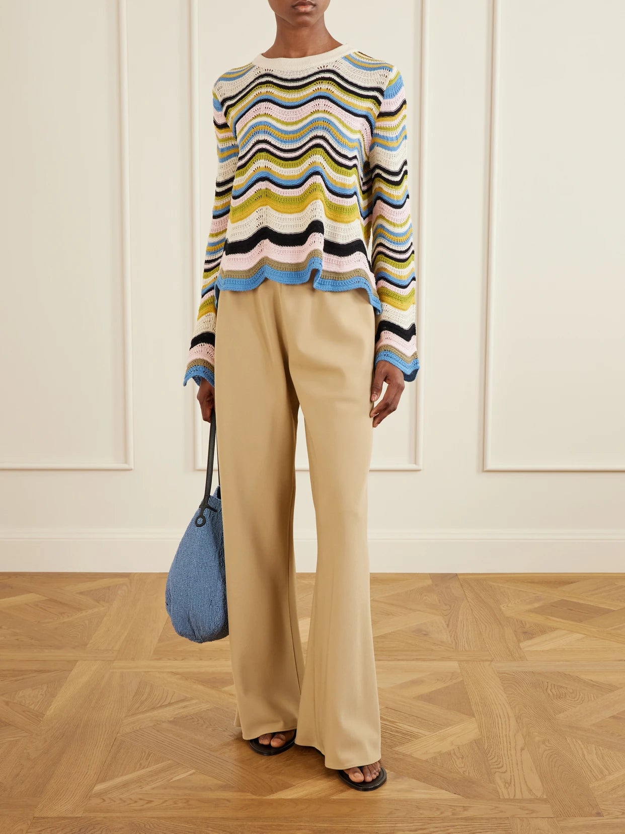 Image of a model wearing Tops. Product name - Scalloped Striped Crocheted Cotton T-shirt in Blue colour by brand - La DoubleJ