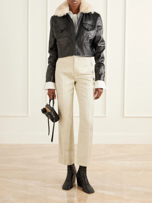 Image of Coats & Jackets. Product name - Raja Cropped Shearling-trimmed Leather Jacket in Black colour by brand - LIBEROWE