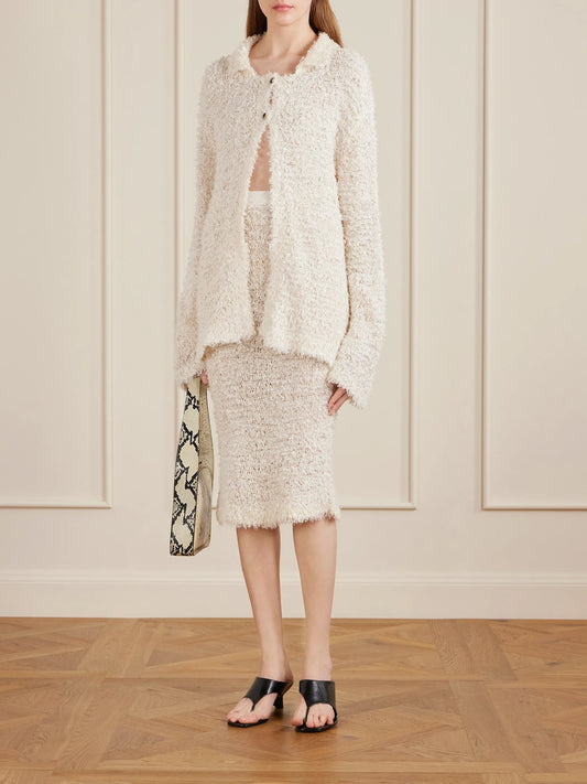 Image of Cardigans. Product name - Jannae Cotton-blend Bouclé Cardigan in Ivory colour by brand - KHAITE